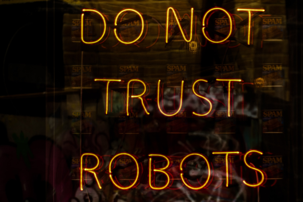 A neon sign that says "do not trust robots." Seems like some good advice for characters in a sci-fi story. Maybe we are all characters in a sci-fi story...