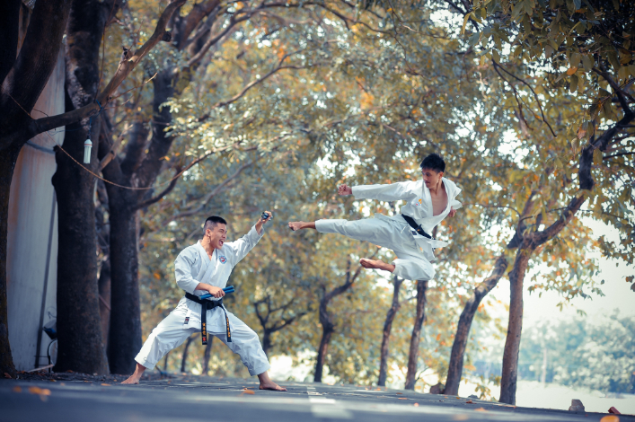 Two martial artists duking it out.