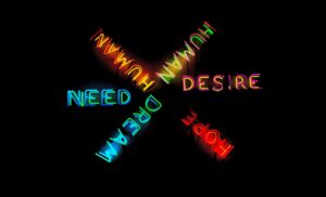 Neon signs showing human wants and dreams