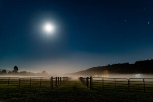the moon displaying a farm fence