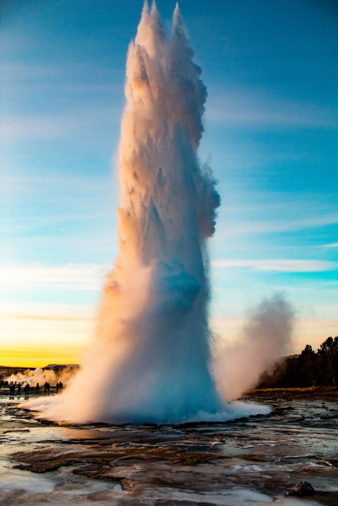 water shooting out of a geyser